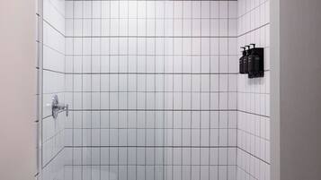 Designer toiletries, hair dryer, towels, soap