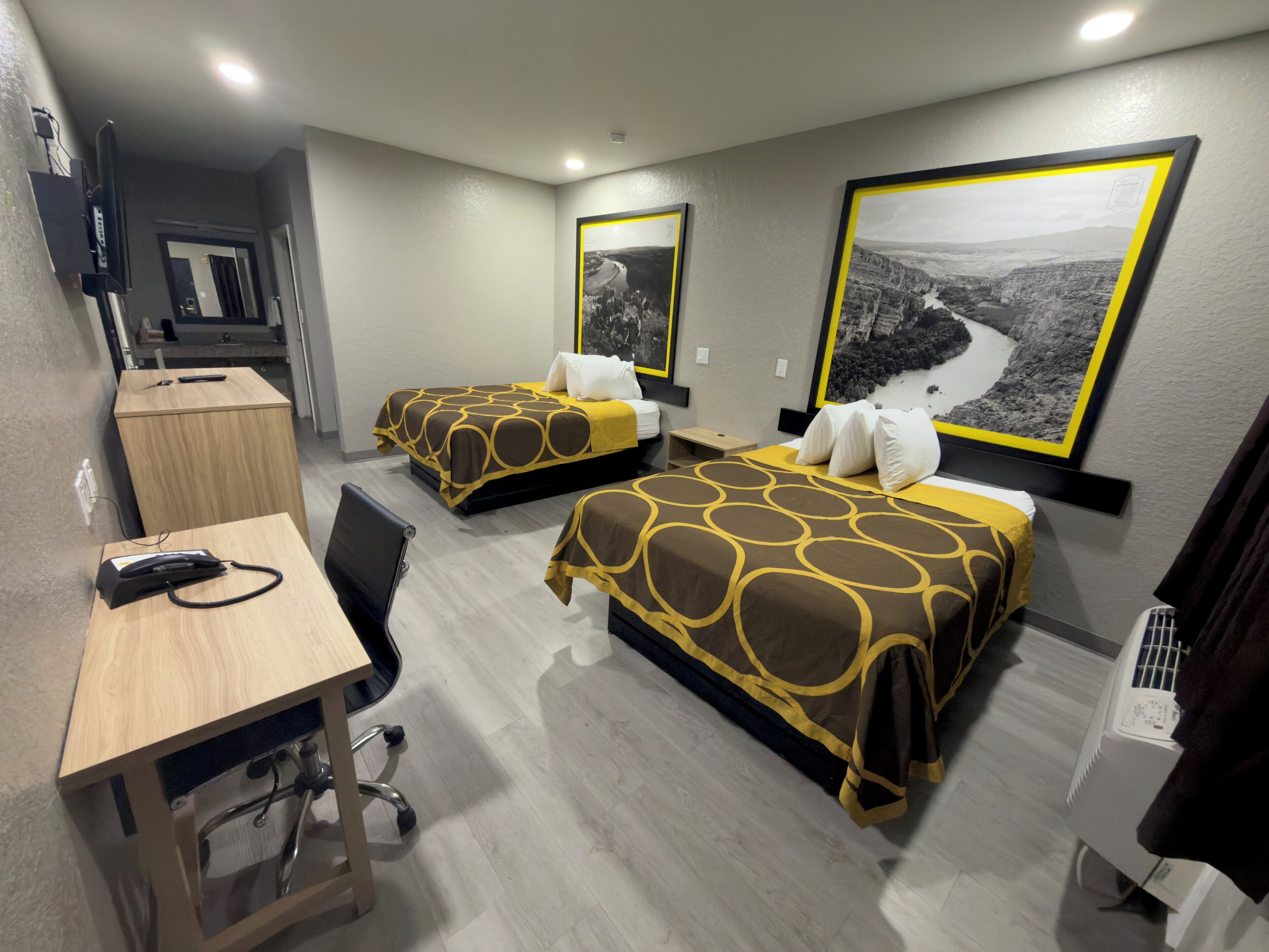 Desk, laptop workspace, iron/ironing board, free cots/infant beds