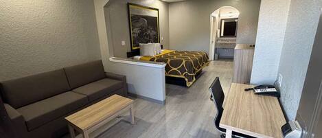 Desk, laptop workspace, iron/ironing board, free cribs/infant beds