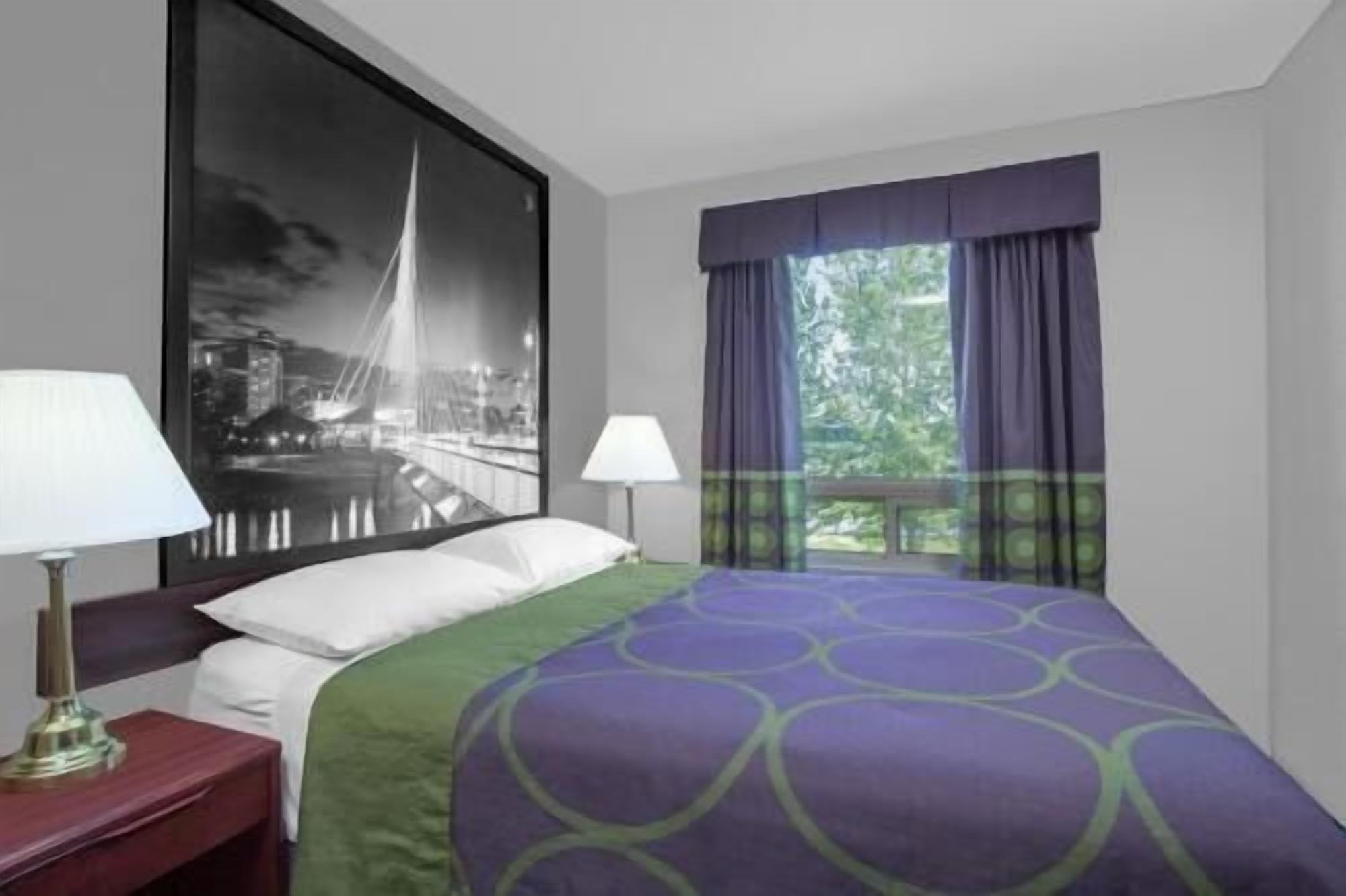 Desk, blackout drapes, iron/ironing board, rollaway beds