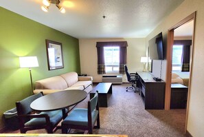 Desk, blackout curtains, iron/ironing board, rollaway beds