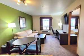 Desk, blackout drapes, iron/ironing board, rollaway beds