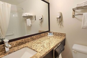 Desk, blackout drapes, iron/ironing board, rollaway beds
