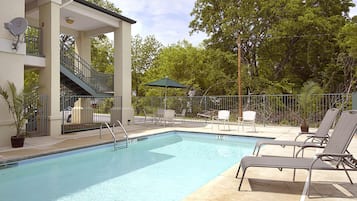 Seasonal outdoor pool, open 8:00 AM to 10:00 PM, sun loungers