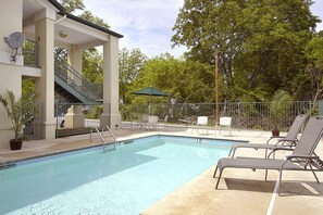 Seasonal outdoor pool, open 8:00 AM to 10:00 PM, sun loungers