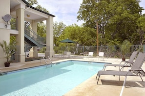 Seasonal outdoor pool, pool loungers