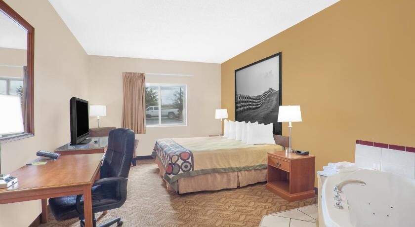 Desk, blackout drapes, iron/ironing board, rollaway beds
