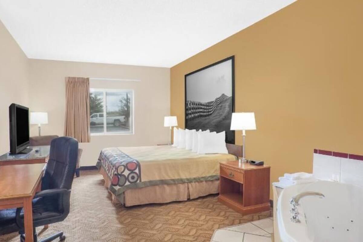 Desk, blackout drapes, iron/ironing board, rollaway beds