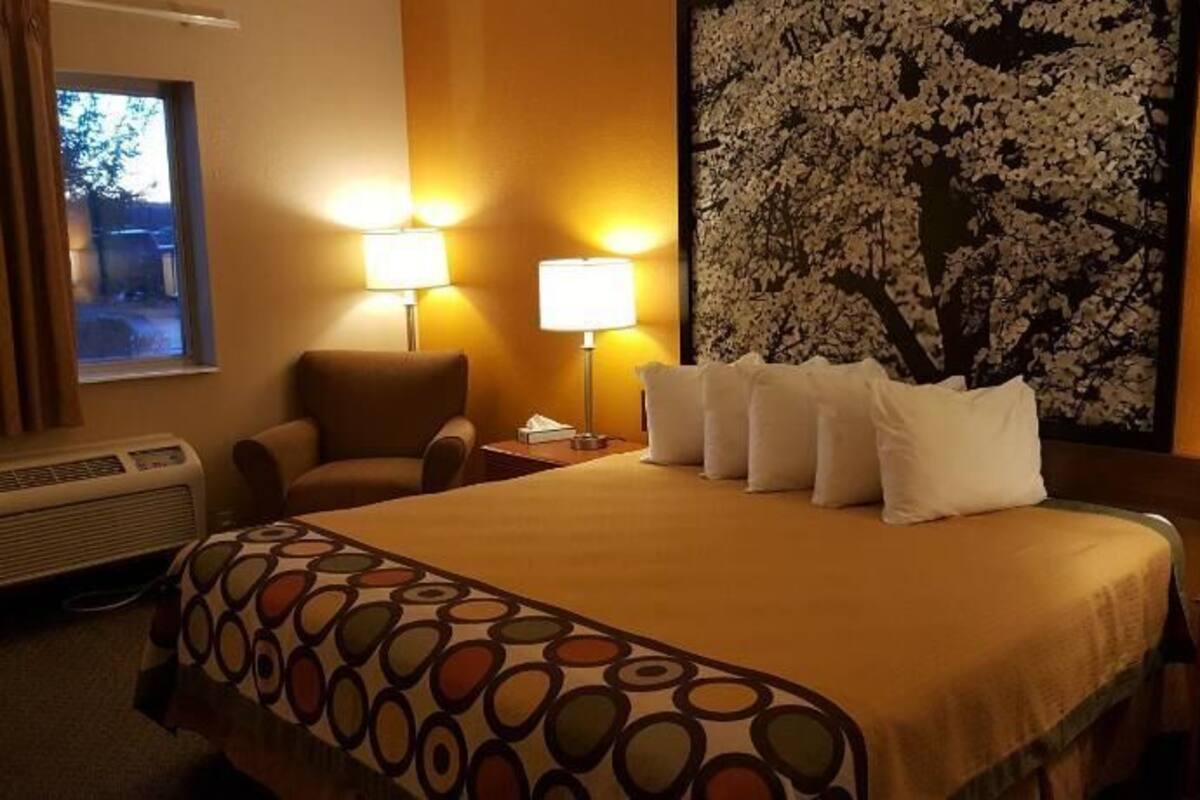 Desk, blackout drapes, iron/ironing board, rollaway beds
