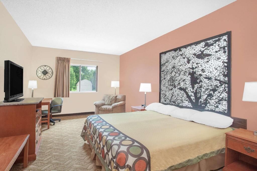 Desk, blackout drapes, iron/ironing board, rollaway beds