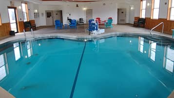 Indoor pool, open 6:00 AM to 11:00 PM, pool loungers