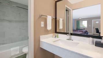Bathtub, hair dryer, towels