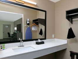 Bathtub, hair dryer, towels