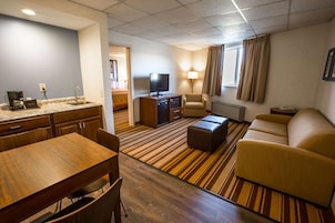 Suite, 1 King Bed, Non Smoking (One-Bedroom) | Pillowtop beds, desk, blackout drapes, iron/ironing board