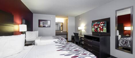 Desk, blackout drapes, iron/ironing board, free cribs/infant beds