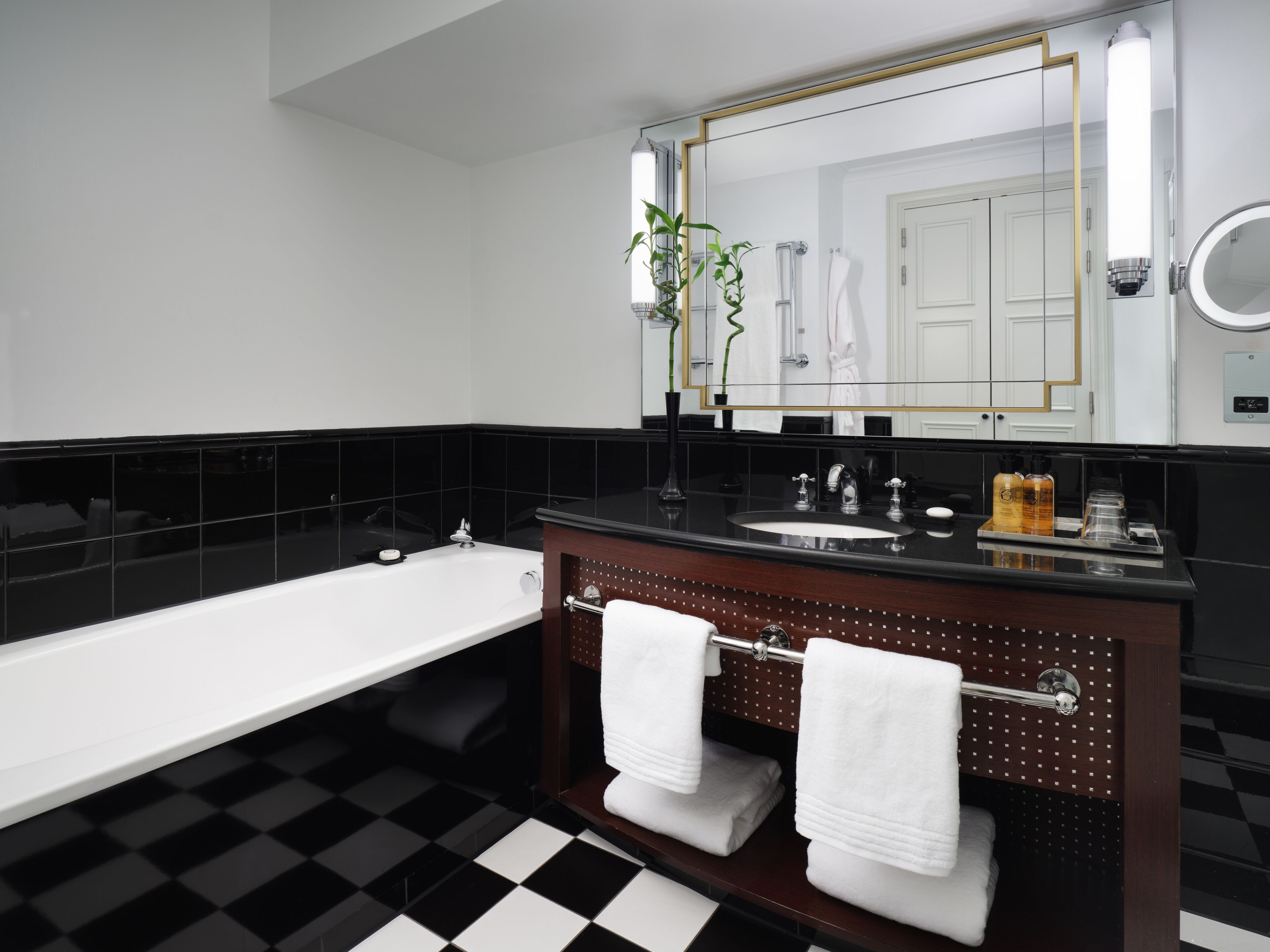 designer toiletries, hair dryer, bathrobes, slippers