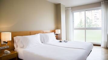 In-room safe, desk, iron/ironing board, free cribs/infant beds