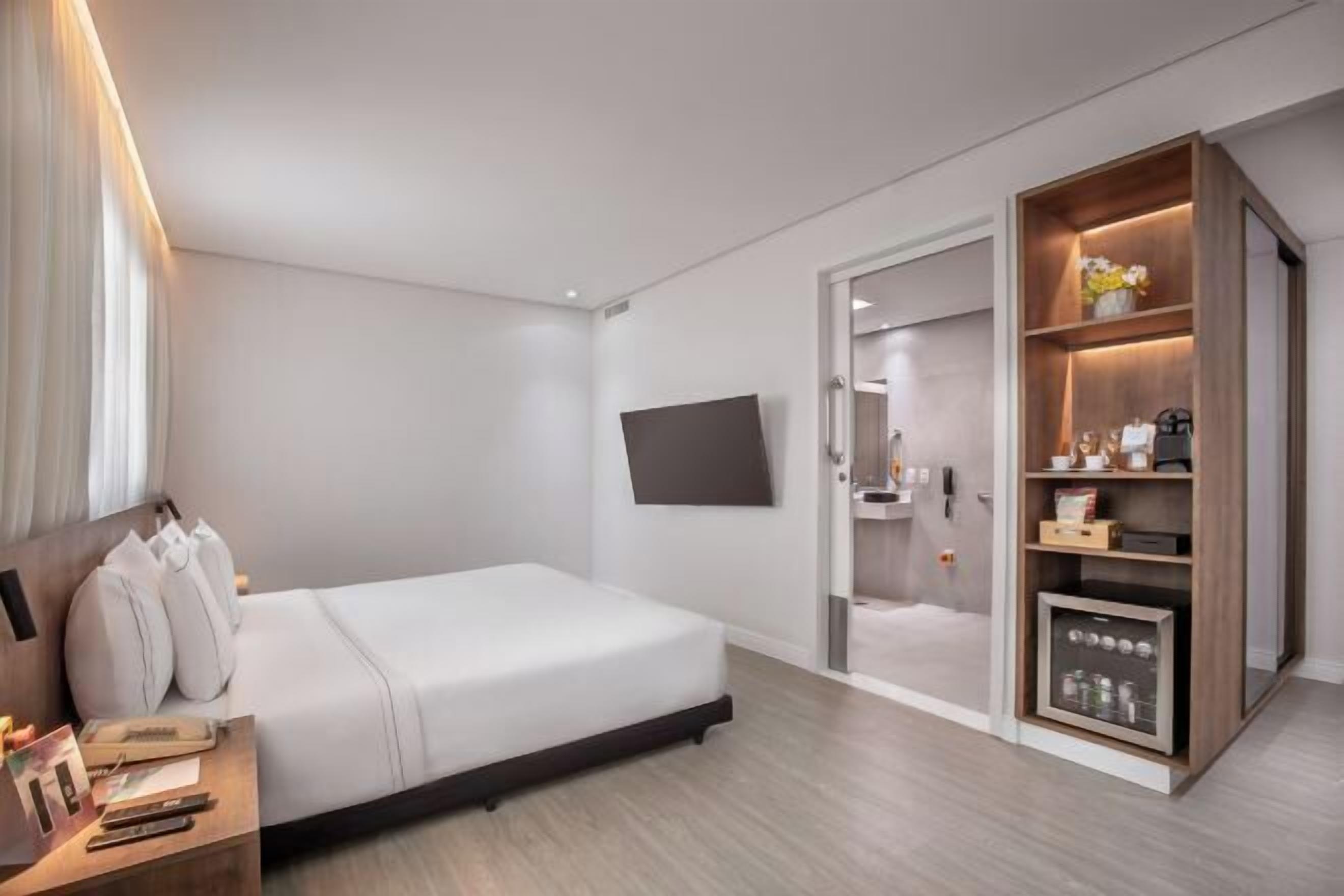 Ropa de cama de alta calidad y minibar 