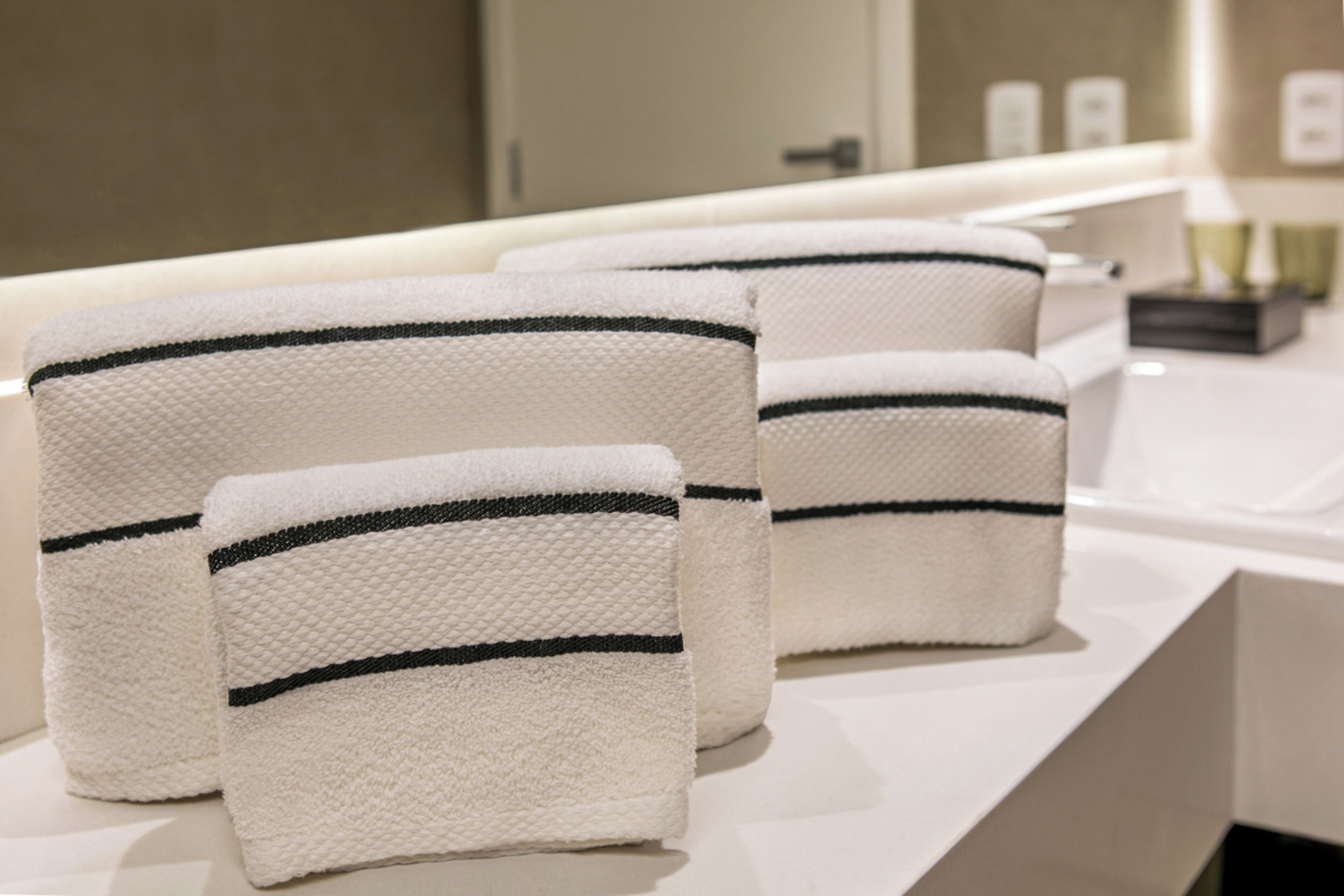 grand premium king bed with balcony | bathroom | shower, rainfall showerhead, eco-friendly toiletries, hair dryer