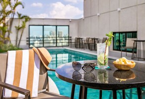 Outdoor pool, open 8:00 AM to 5:00 PM, sun loungers