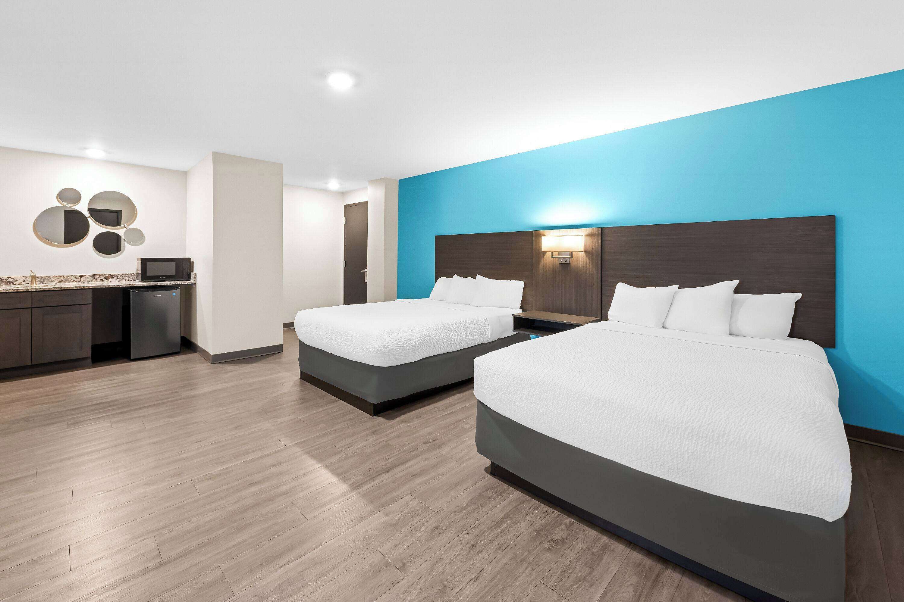Superior Room, 2 Queen Beds, Non Smoking (Sofa Bed, No Pets) | Desk, laptop workspace, iron/ironing board, bed sheets