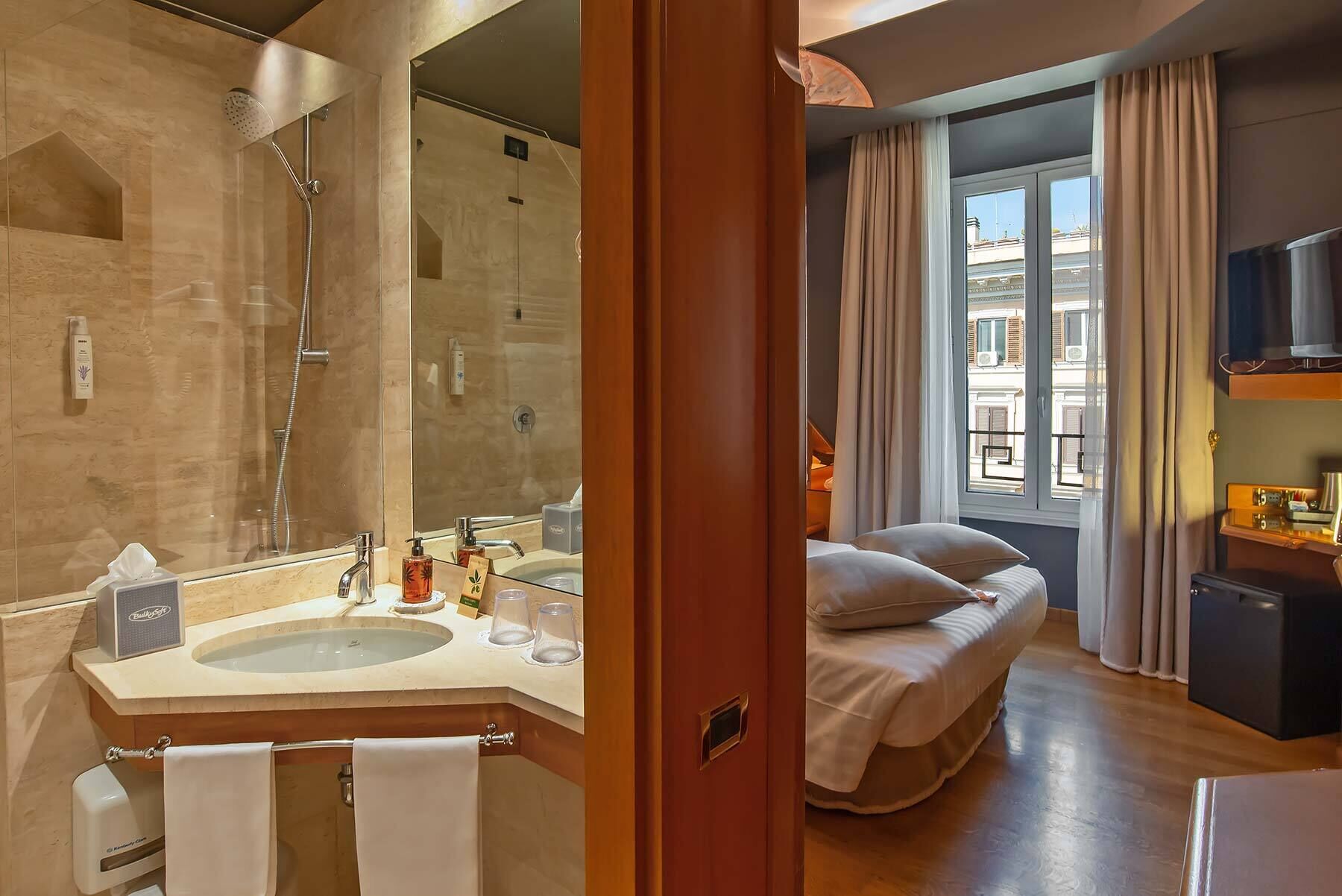 standard double room | bathroom | shower, free toiletries, hair dryer, slippers