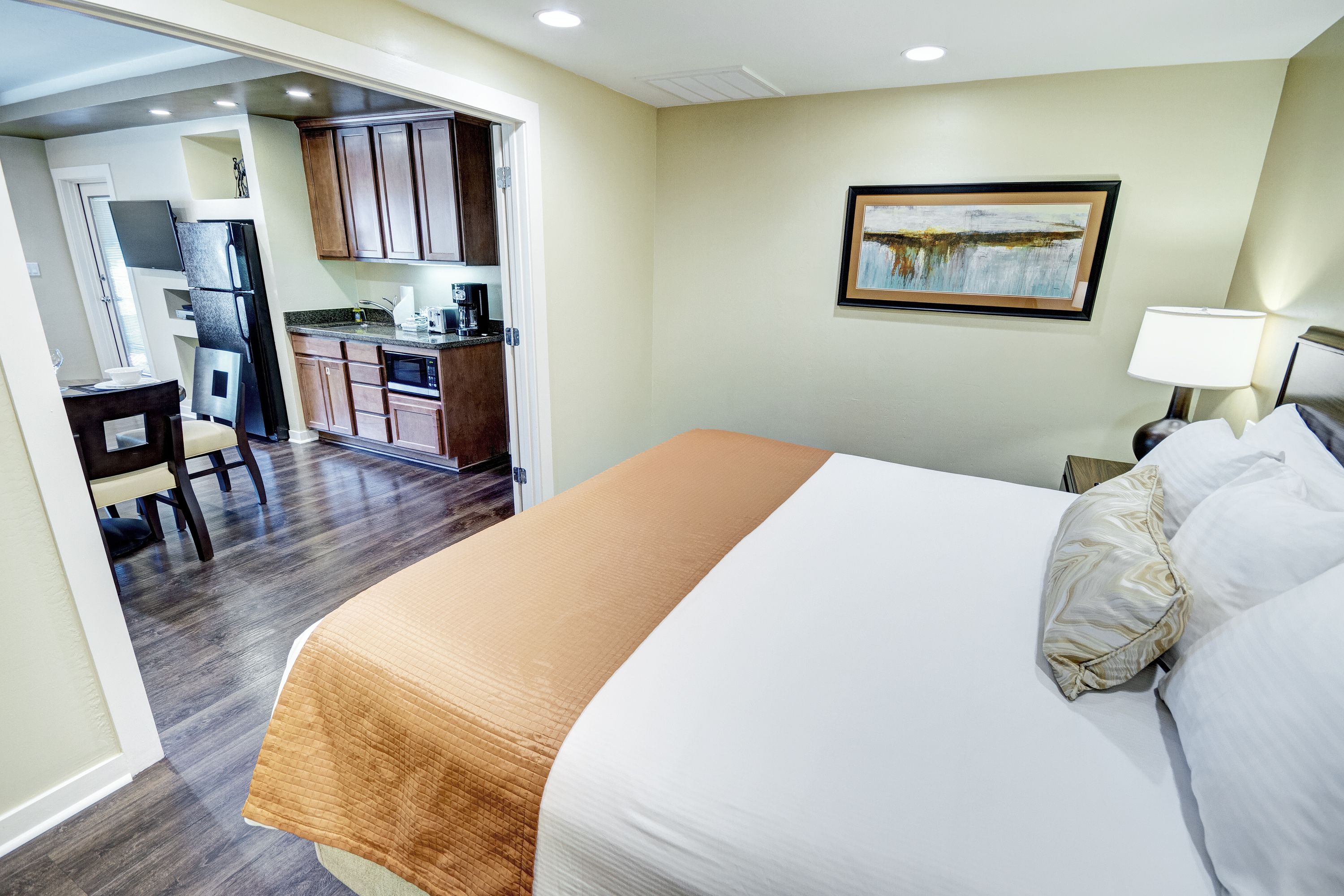 suite, 1 bedroom, kitchenette | premium bedding, pillow-top beds, in-room safe, iron/ironing board