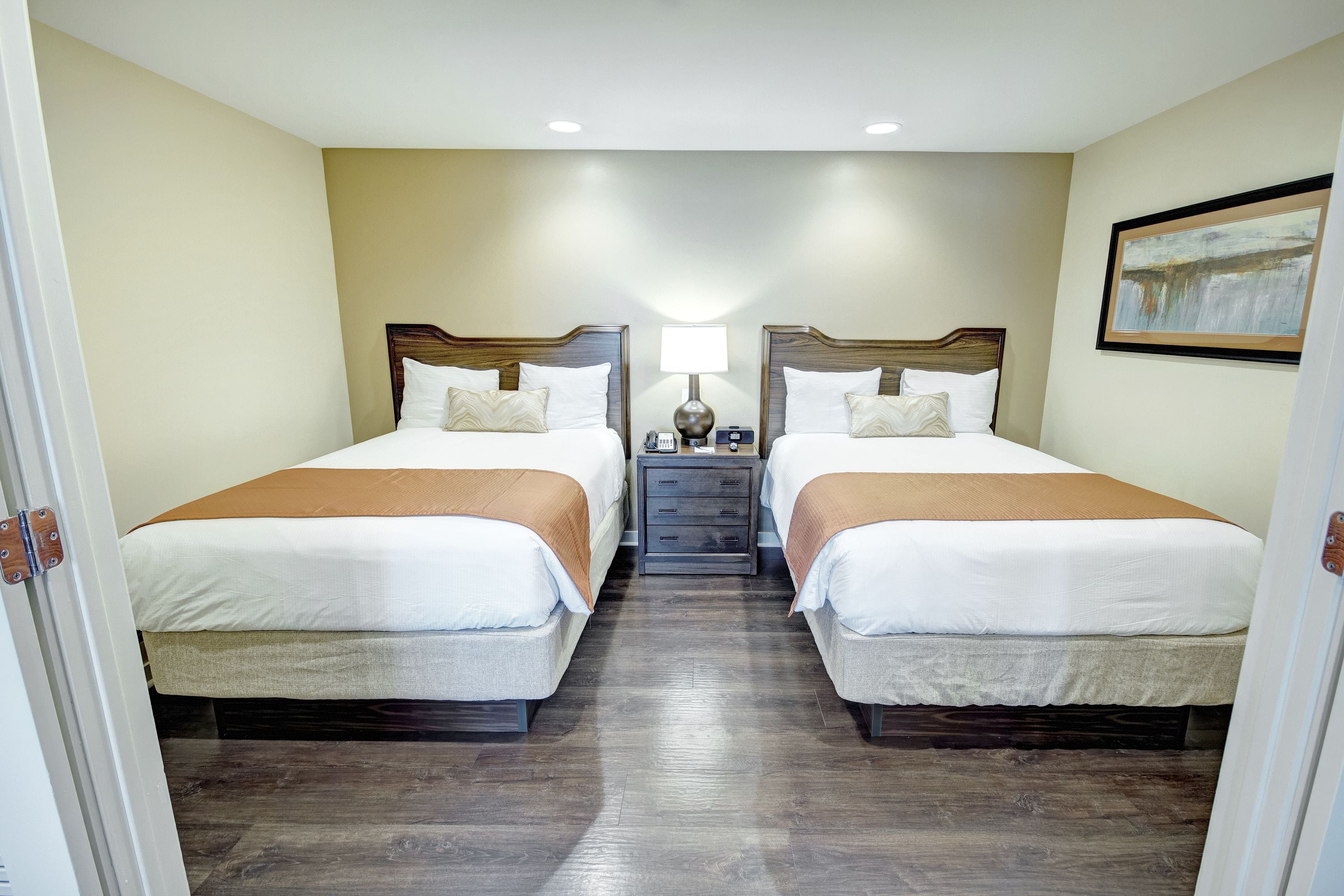 suite, 1 bedroom, kitchenette | premium bedding, pillow-top beds, in-room safe, iron/ironing board