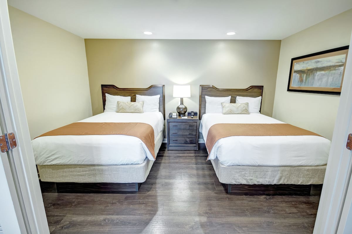 suite, 1 bedroom, kitchenette | premium bedding, pillow-top beds, in-room safe, iron/ironing board