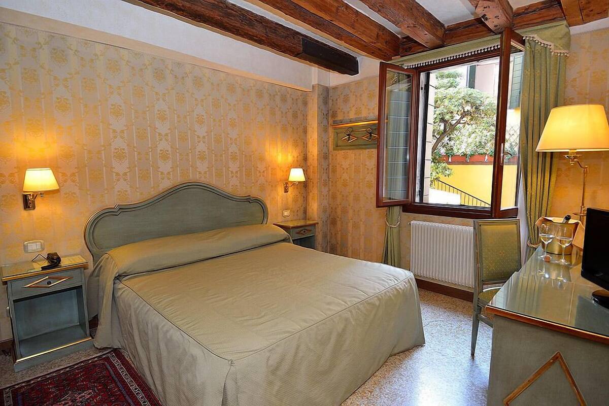 Premium bedding, down duvets, Select Comfort beds, minibar