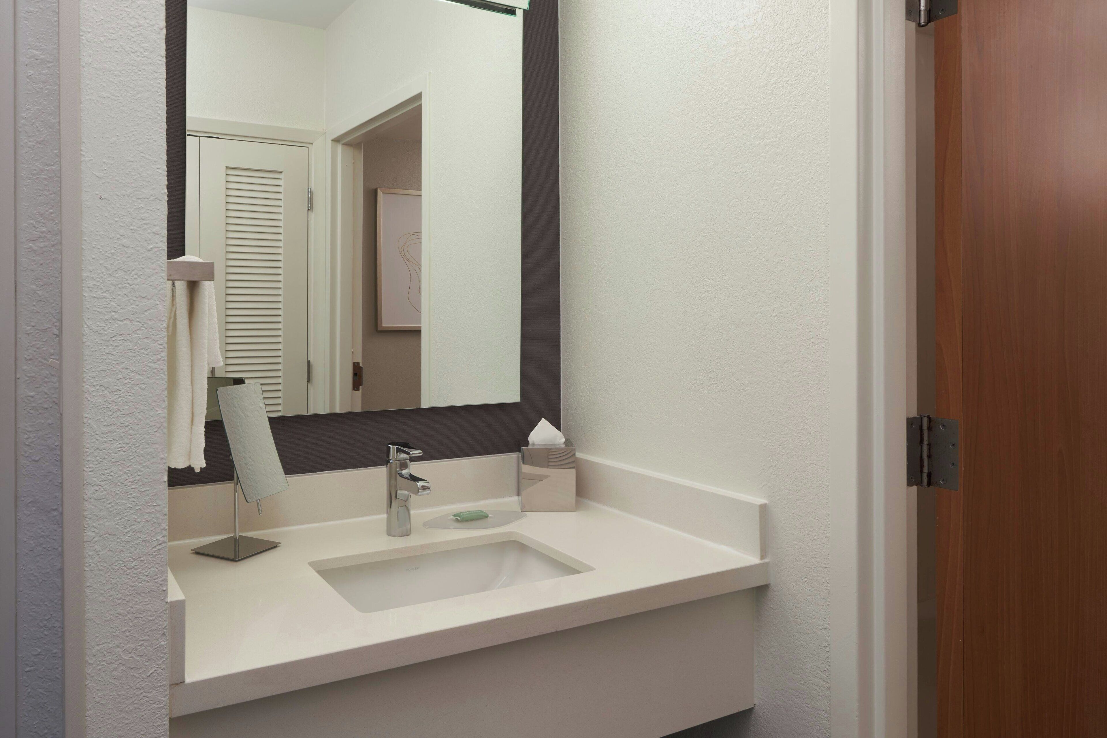 premium bedding, desk, laptop workspace, blackout curtains