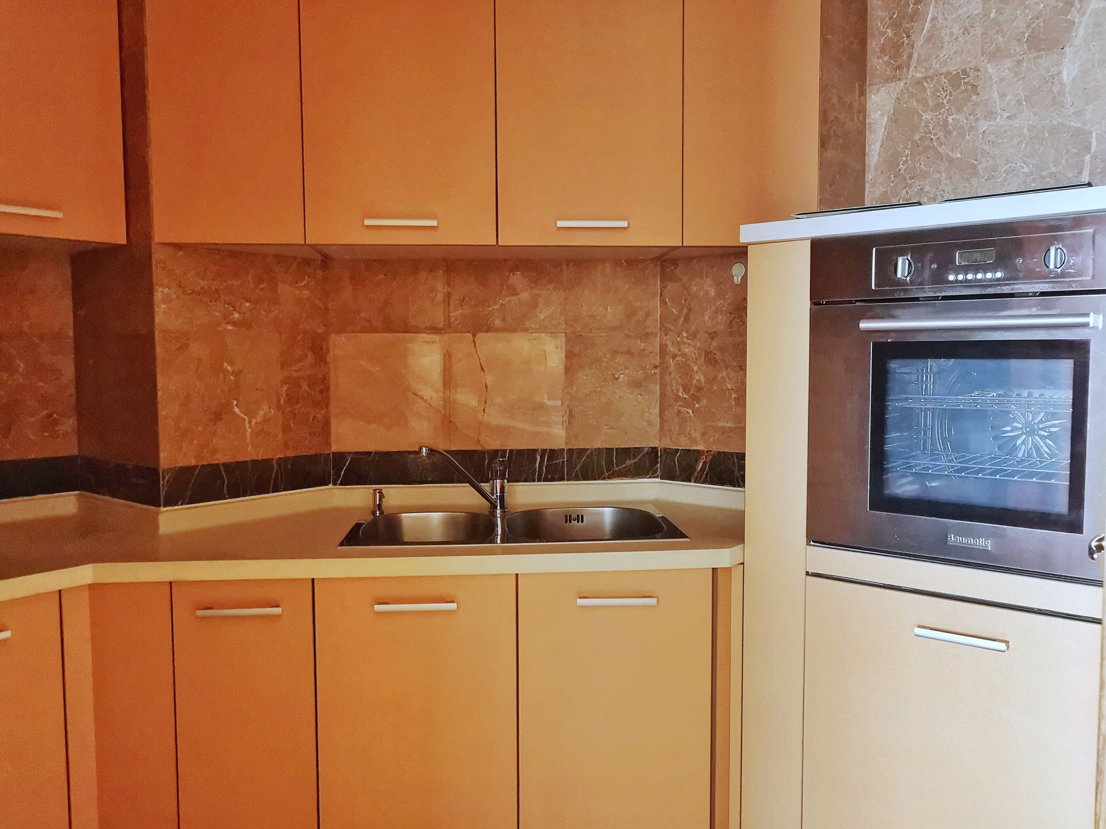 fridge, microwave, stovetop, electric kettle