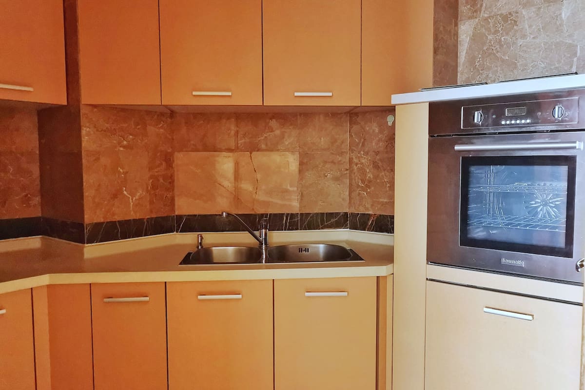 fridge, microwave, stovetop, electric kettle