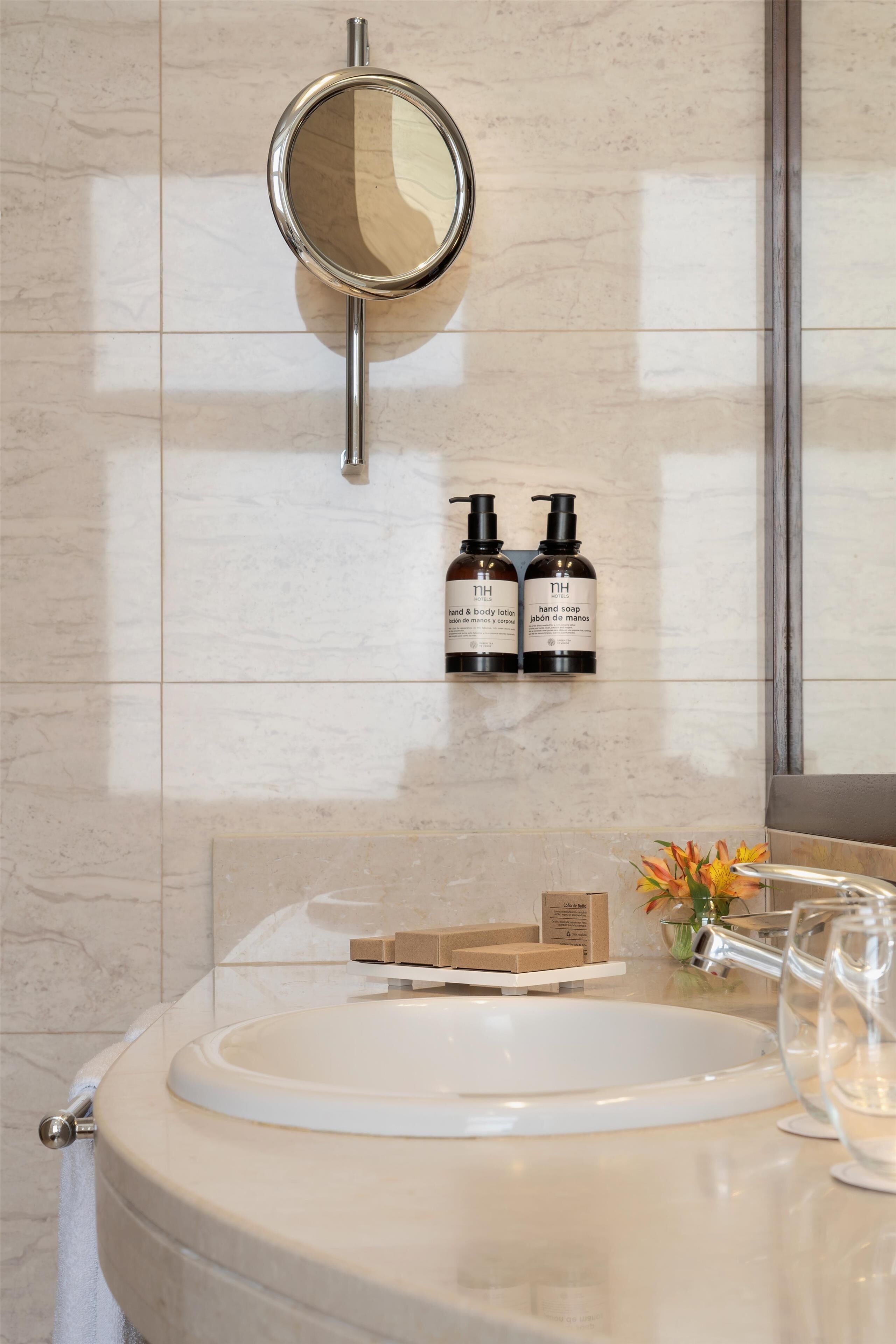 deep-soaking bathtub, rainfall showerhead, eco-friendly toiletries