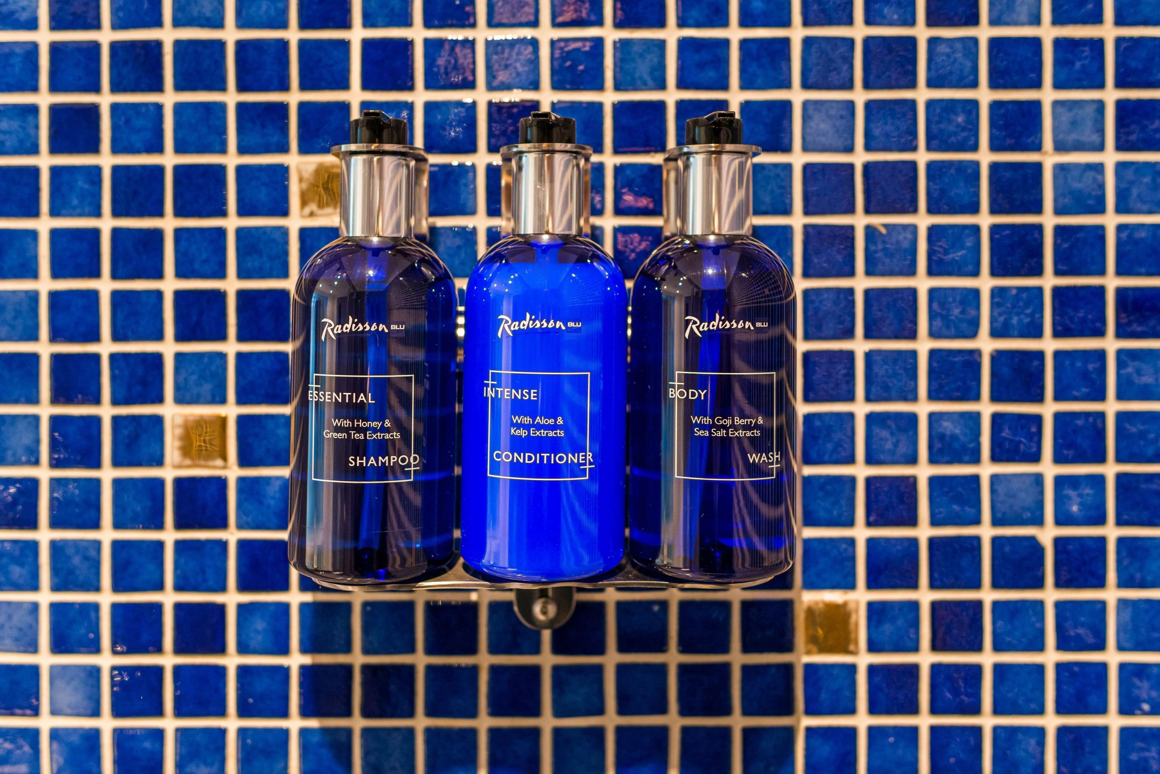 eco-friendly toiletries, hair dryer, towels