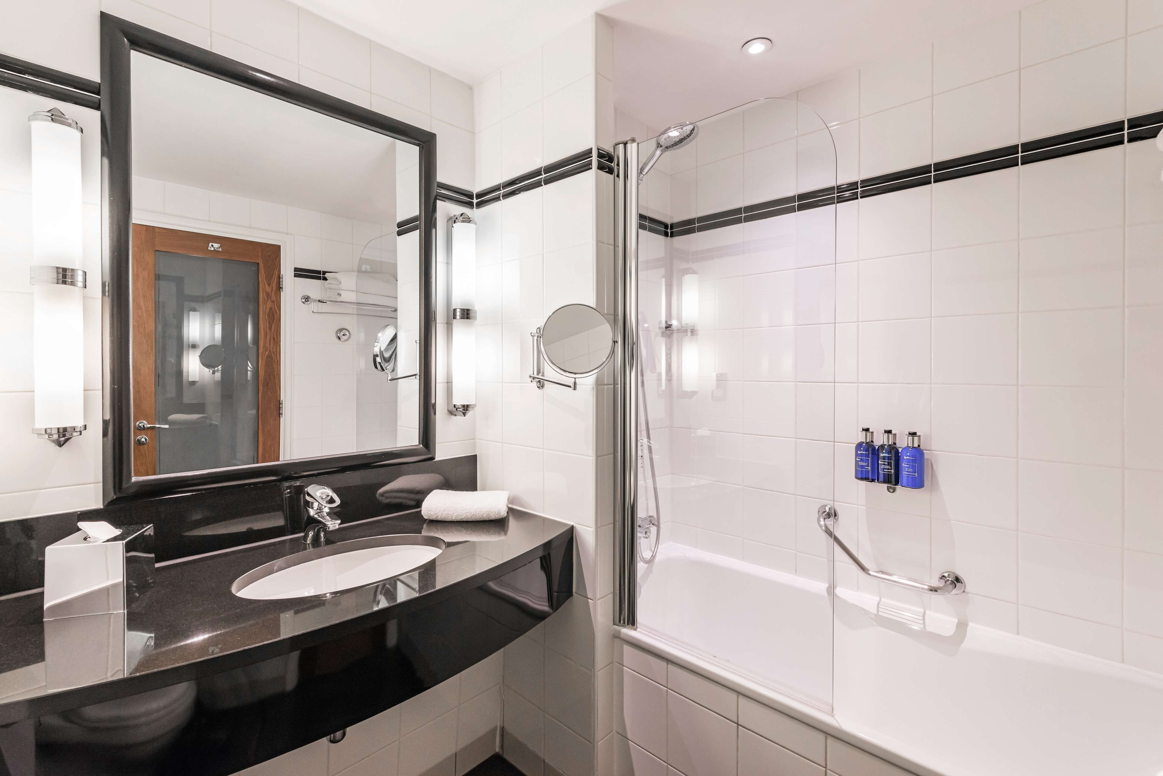 eco-friendly toiletries, hair dryer, towels