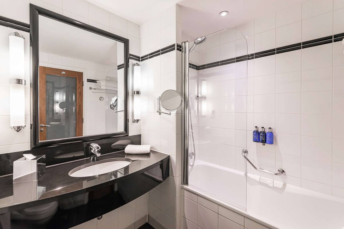 eco-friendly toiletries, hair dryer, towels