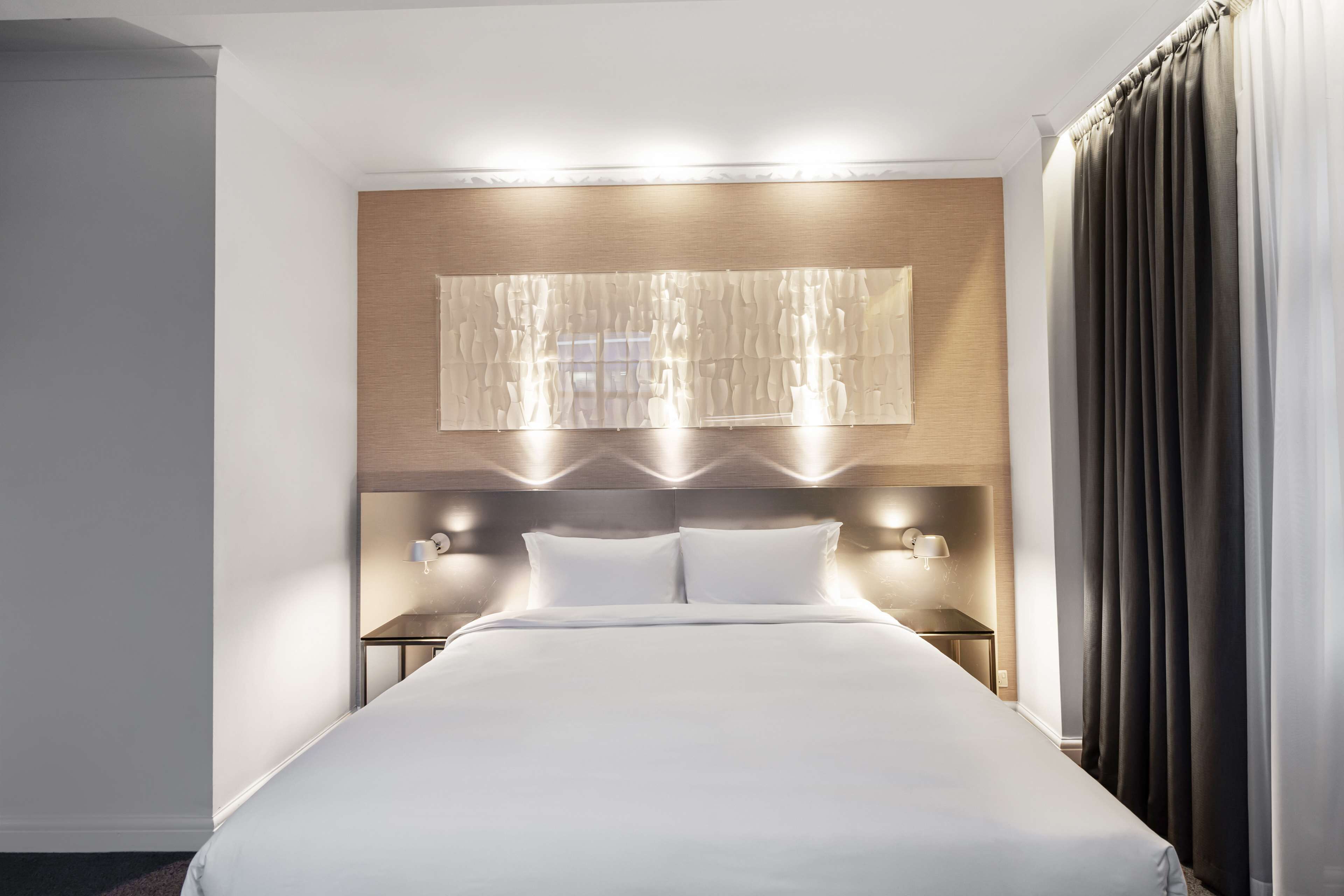 junior suite | in-room safe, desk, iron/ironing board, rollaway beds