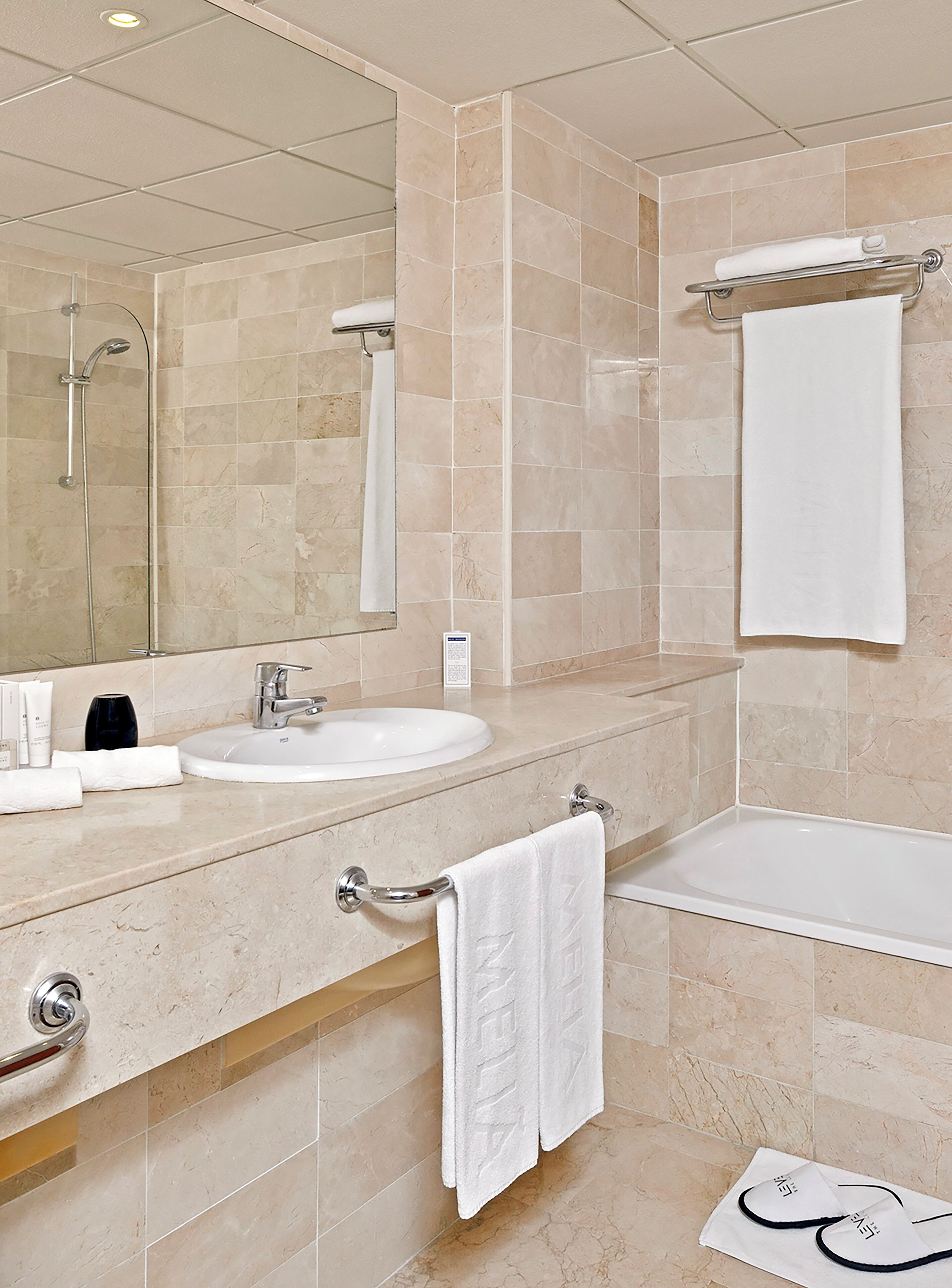 hair dryer, bidet, towels, soap