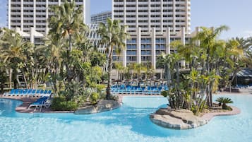 Indoor pool, pool umbrellas, pool loungers