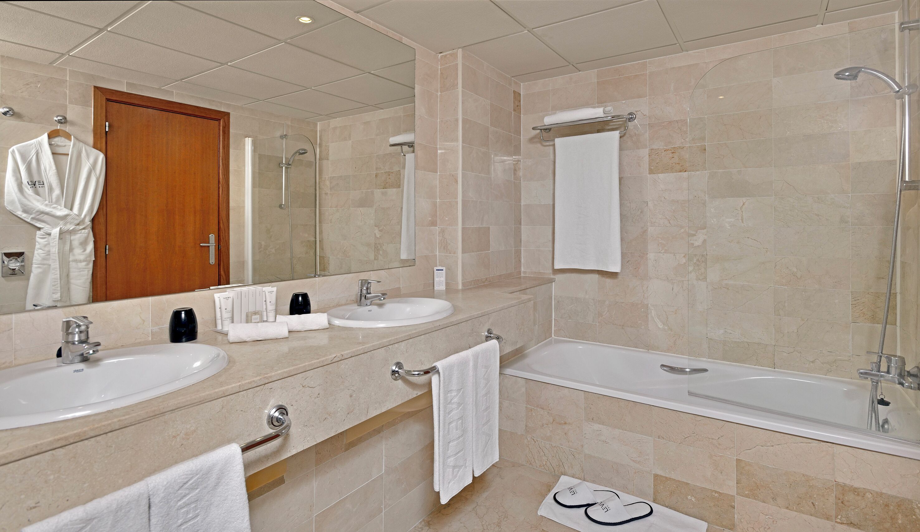 hair dryer, bidet, towels, soap