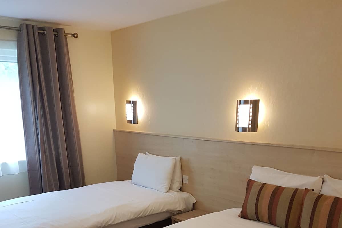 1 habitación, ropa de cama de alta calidad y colchones Select Comfort