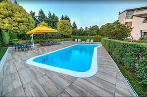 Seasonal outdoor pool, sun loungers