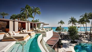 Outdoor pool, open 7:00 AM to 7:00 PM, cabanas (surcharge)