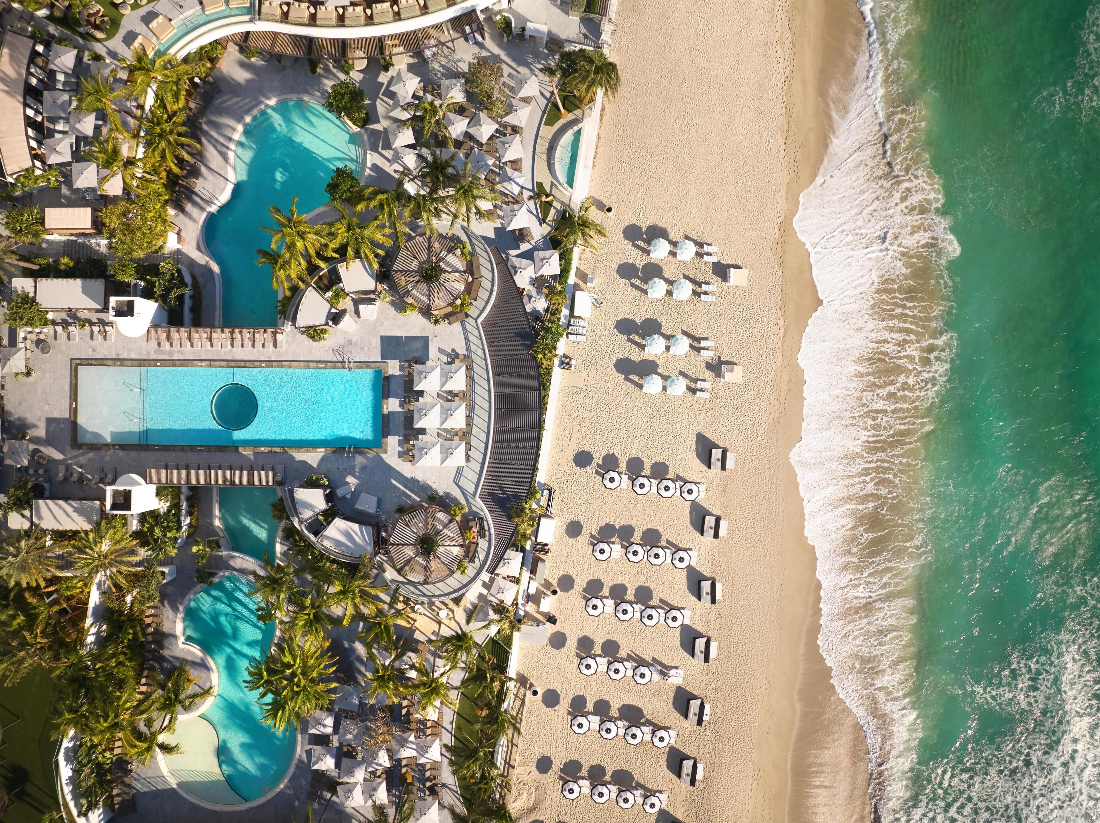 On the beach, beach cabanas, sun loungers, beach umbrellas