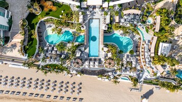 On the beach, beach cabanas, sun-loungers, beach umbrellas