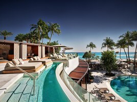 Outdoor pool, open 7:00 AM to 7:00 PM, pool cabanas (surcharge)