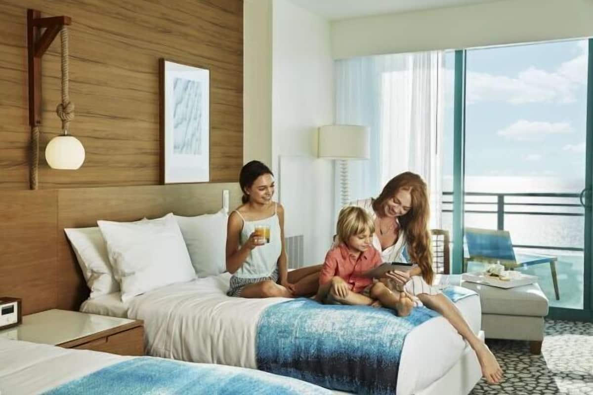 Premium bedding, pillow-top beds, in-room safe, iron/ironing board