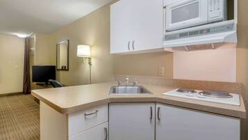 Studio, 1 King Bed, Non Smoking | Private kitchen | Fridge, microwave, stovetop, coffee/tea maker