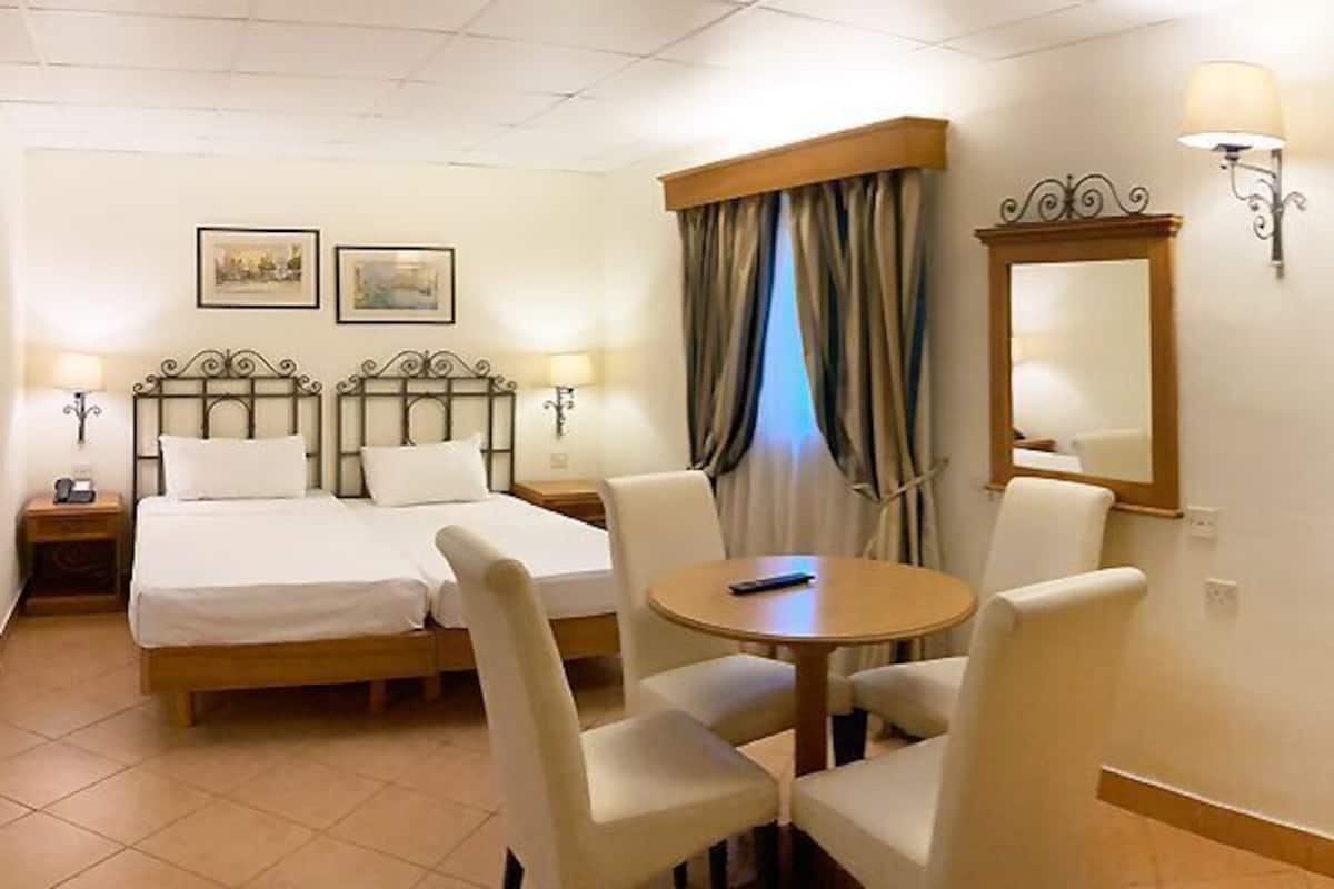 Minibar, desk, laptop workspace, blackout drapes